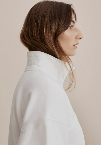 white sweater