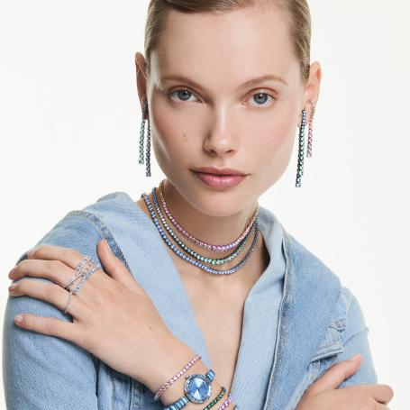 Woman wearing Swarovski jewellery