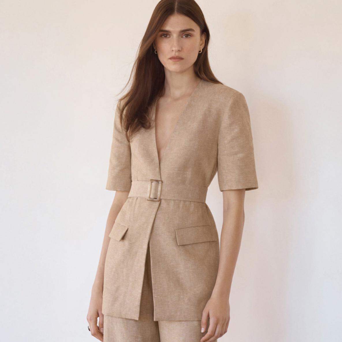 Woman wearing beige suit